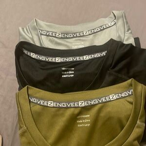 Three men’s dri fit shirts.  Brand new never worn.  Black, grey, army green.